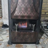 بخاری دودکش دار سالم در حال کار