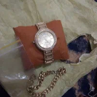 ست زنانه ساعت ودستبندوته گوشی