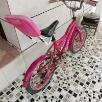 دوچرخه دخترانه رنگ صورتی