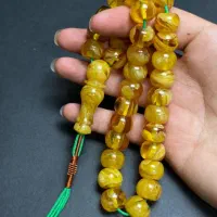 تسبیح کهربا رگه دار