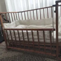 تخت گهواره ای کودک