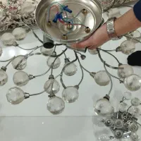 لوستر سقفی یک عدد بزرگ و دو عدد کوچک|لوستر و چراغ آویز|اهواز, فرهنگ شهر|دیوار