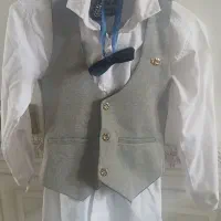 جلیقه و شلوار و پیرهن و دو تا پاپیون