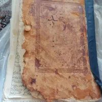 کتاب قرآن خطی دستخط