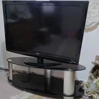 تلویزیون LG  و زیر تلویزیون