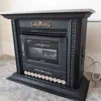 بخاری ۱۲۰۰۰ طرح شومینه سال و فرش ۹متری ۳تخته