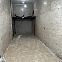 یک باب مغازه ماسوربرخیابان اصلی بهارستان