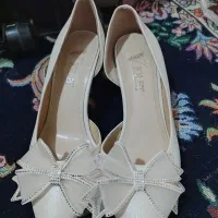 لباس عقد|لباس|باقرشهر, |دیوار