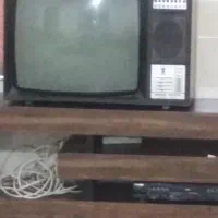 تلویزیون کلکسیون و قالیچه دست باف قدیمی