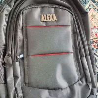 کوله مدرسه|کیف، کفش، کمربند|قم, امامزاده ابراهیم|دیوار