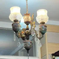 لوستر برنج کاری و قدیمی با طرح های حک شده