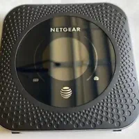 مودم نت گیر netgear m1 و کیبورد میکروسافت سرفیس