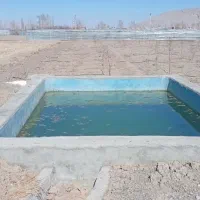 فروش-زمین-باغی-دارای-استخر-قیمت-مناسب