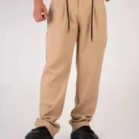 شلوار نیم بگ پارچه کجراه وارداتی (کرم مشکی سبز)