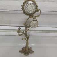ساعت برنز و دو عدد بالرین،