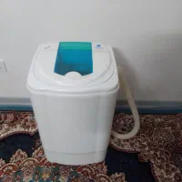 ماشین لباسشویی و تعدادی لوازم منزل