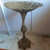 کنار سالنی برنزی قدیمی سنگین