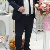 کت شلواردرحدسرمه ای پارچه یک سایز۴۸ ۵۰ ۵۲