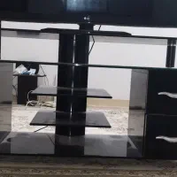 میز تلویزیون شیشه ای مشکی کاملا سالم