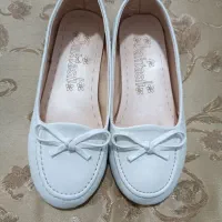 کفش و لباس بچه