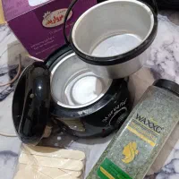 دستگاه موم گرم کن همراه با یه بسته موم