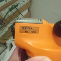 دوربین نقشه برداری و ۳ پایه