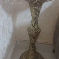 میوه خوری کنار سالنی برنز