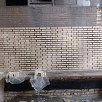 اجرای آجرنمای سوله ساختمان ودیوار محوطه