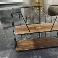 استند دو طبقه با اسکلت فلزی مشکی