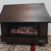 بخاری گازی  نیک کالا طرح شومینه