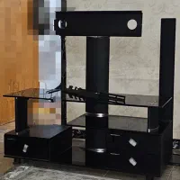 میز تلویزیون شیشه ای پایه دار