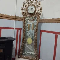 ساعت ایستاده و آینه شعمدان طلایی