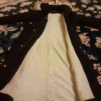 کاپشن|لباس|رباطکریم, رباطکریم|دیوار