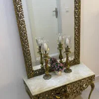 اینه شمعدان تمام برنزی سنگ روی میز مرمر