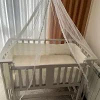 تخت کنار مادر