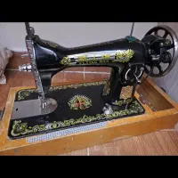 چرخ خیاطی مرد پرنده