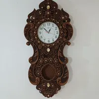 ساعت دیواری وپرده سلامت
