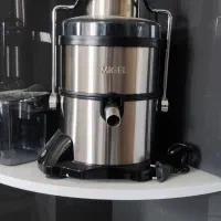 آب میوه گیری میگل