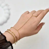 تمیمه و دستبند و زنجیر بدن استیل زنانه