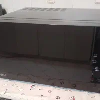 ماکروفر در حد نو با جعبه
