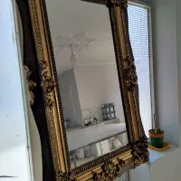 اینه چوبی کنده کاری شده