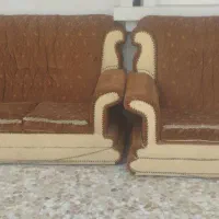 مبل چهار تیکه همراه با دوعدد میز شیشه ای