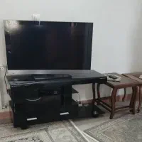 میز تلویزیون شیشه ای