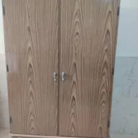 یک عدد کمد لباس و یک عدد کتابخانه جنس چوب