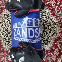 کیسه بوکس به همراه دست کش