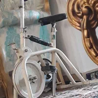 دوچرخه ثابت و دستگاه ویبره