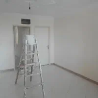 نقاش نقاشی ساختمان تعمیرنم