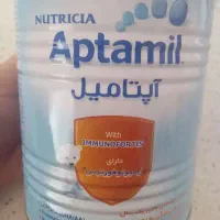 تعدادی قوطی خالی شیرخشک