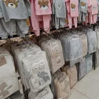 لباس نوزادگرفته تاتخت خواب سیسمونی