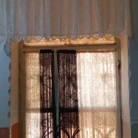 فروش پرده و پشت دری همراه با کتیبه
